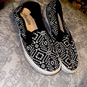 Pair of girls slip ons